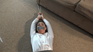 asslegsthighsandties.com - Cindy Tape Gagged and Stretched Out on Floor thumbnail