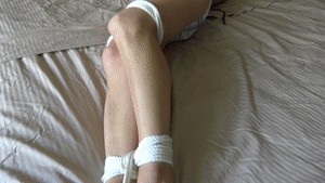 asslegsthighsandties.com - Yana Tape Gagged on the Bed thumbnail
